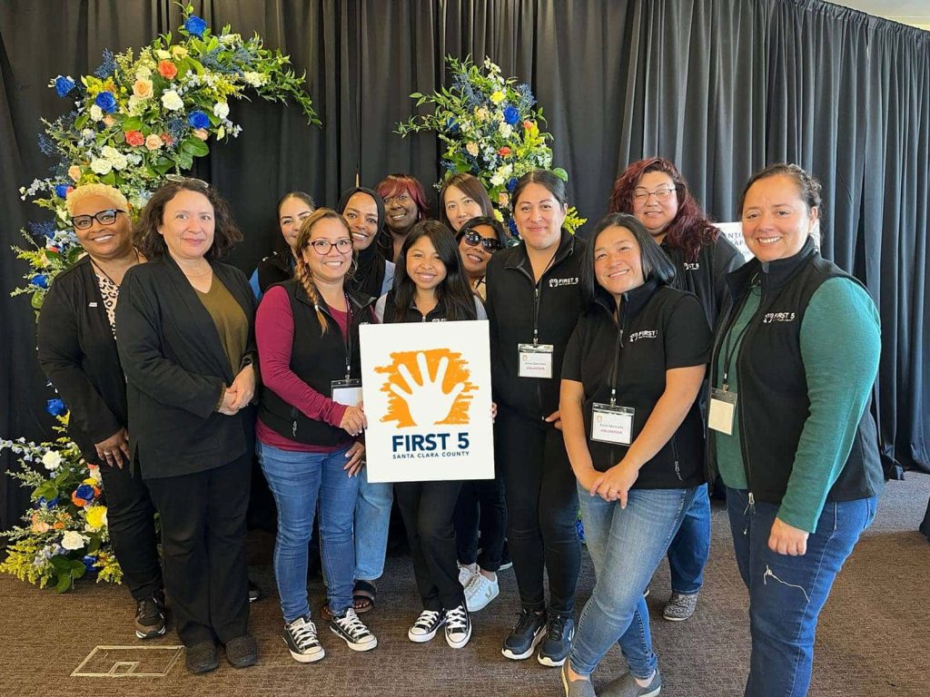 FIRST 5 staff pose as a group during the Family Child Care Leadership Conference in 2024.